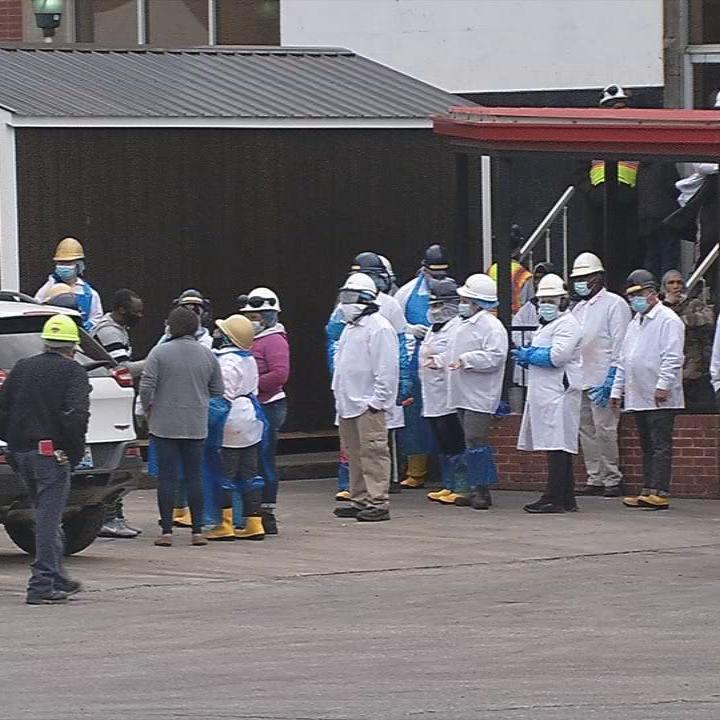 Workers outside the JBS plant on Story Avenue in Butchertown